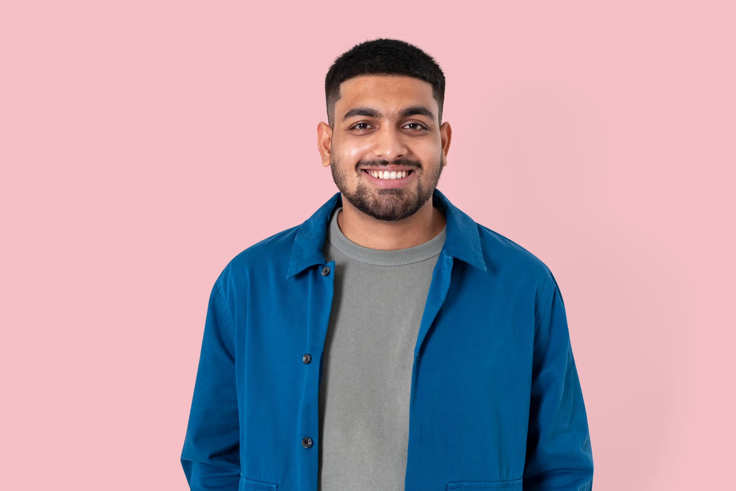 indian man smiling cheerful expression closeup portrait scaled