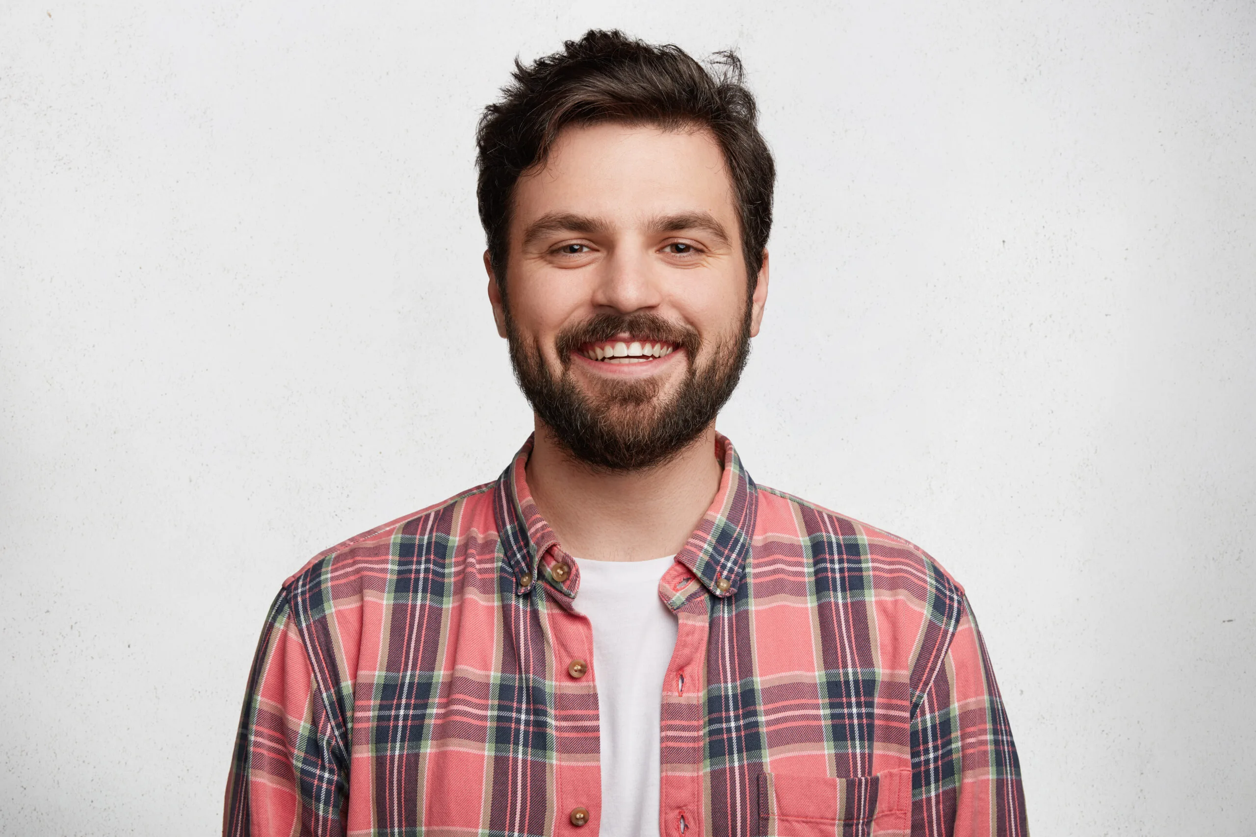 young bearded man with striped shirt scaled