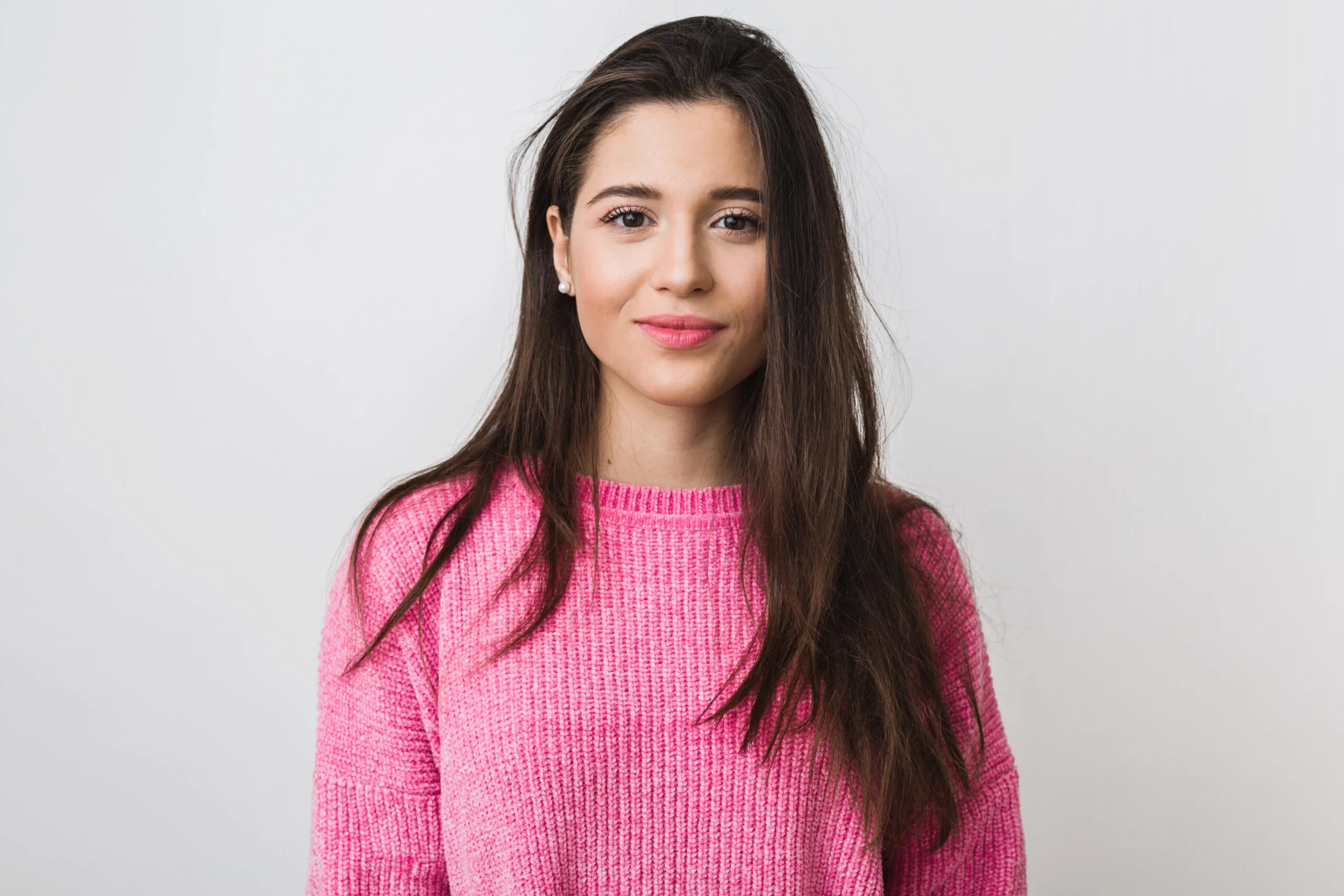 young beautiful woman pink warm sweater natural look smiling portrait isolated long hair scaled
