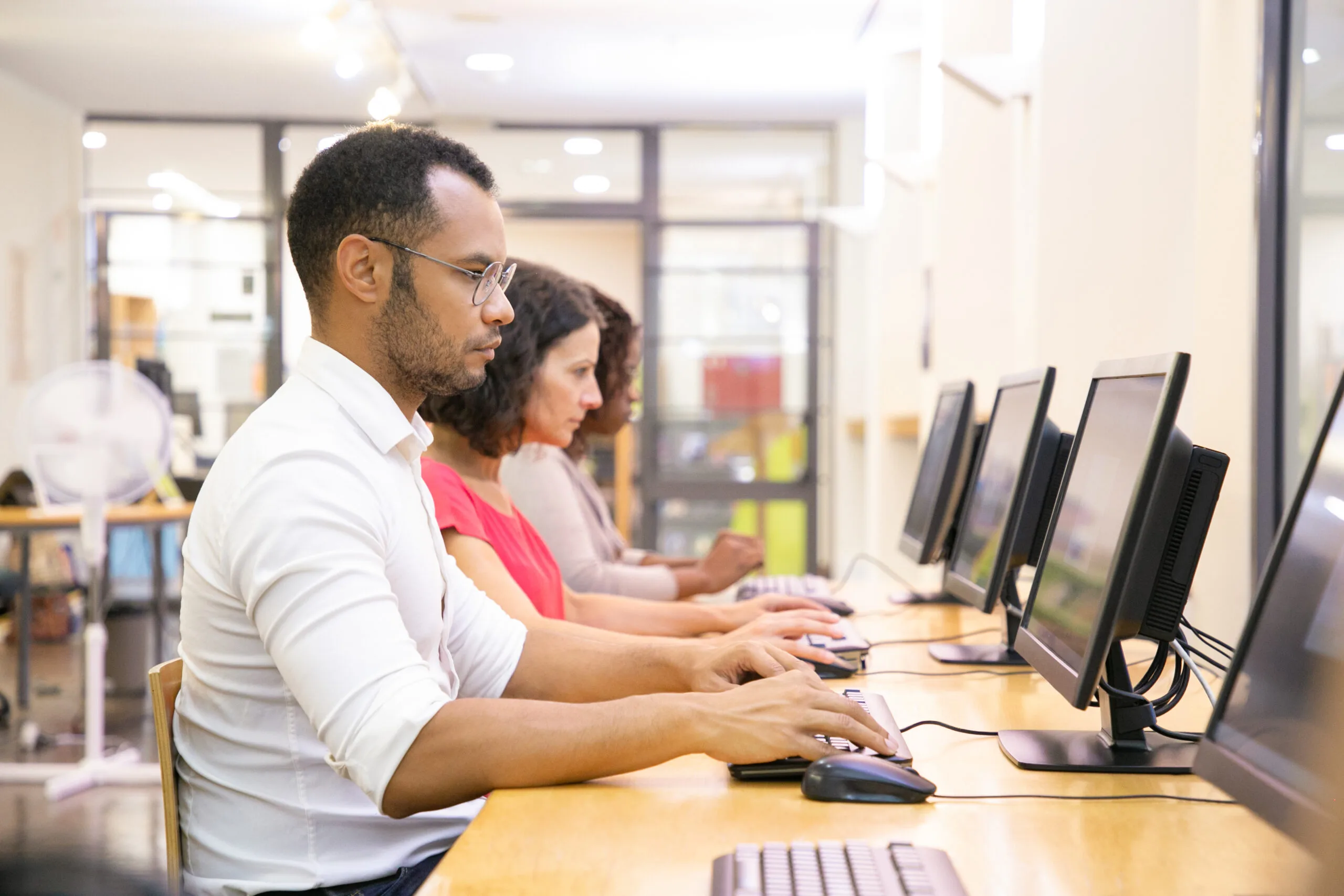 diverse group students taking online tests scaled